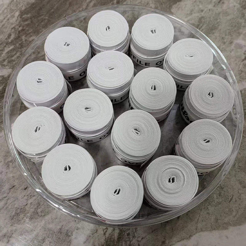 Pack de 12 overgrips perforados W Padel Pro para un agarre y comodidad mejorados, con tacto suave y diseño perforado en